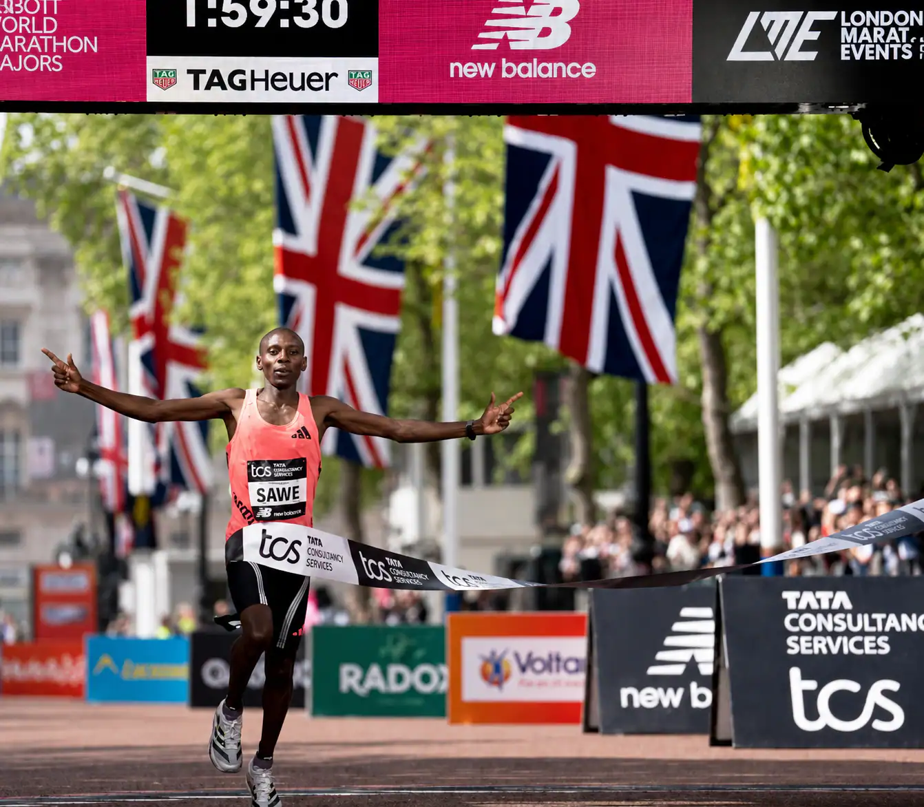 Runner Sebastian Sawe crossing the finish line at the 2026 TCS London Marathon.